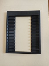 CD Or DVD Storage Rack. Black Plastic