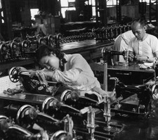 Workers assembling and testing