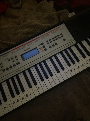 The piano has letters - the, on