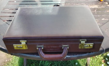 Brown leather brief case with fitted interior combination locks