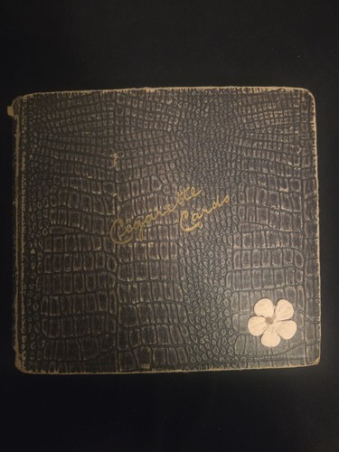 Vintage cigarette card album - card,