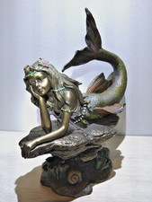 Mermaid lies on Rock - Tail