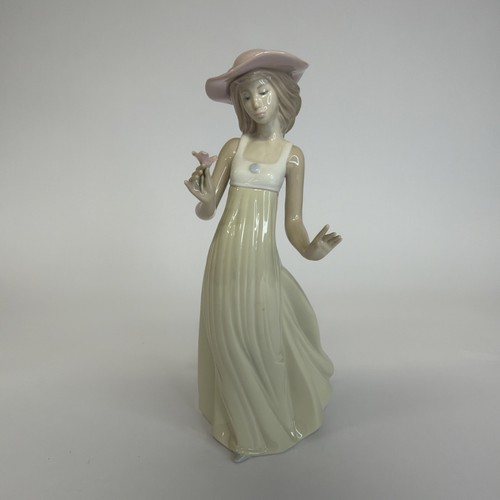 Nao lladro figurine - by,