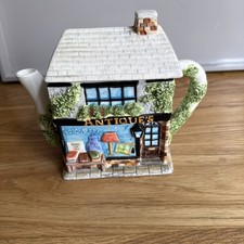 Western House Village Teapot