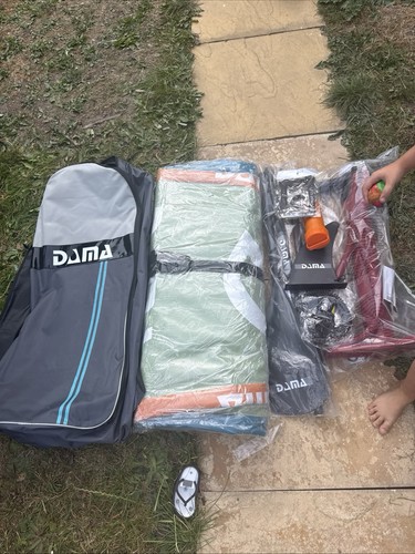 Dama stand paddleboarding - dama,