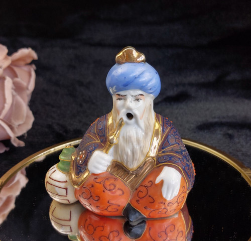 Colorful oriental pipe smoker - colorful,