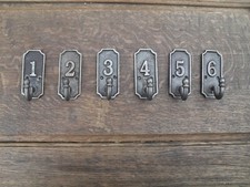 set of 6 church cloakroom cast iron coat hooks numbered 1 to 6 hanging hooks 11E
