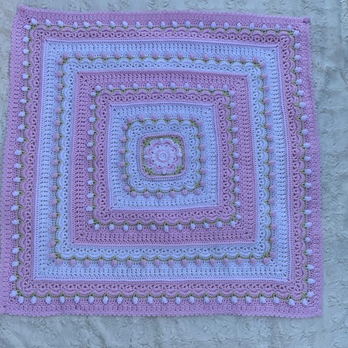 Beautiful hand crocheted baby - hand,