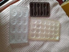 Polycarbonate Chocolate Mould. coins and eggs plus silicone chocolate spoons
