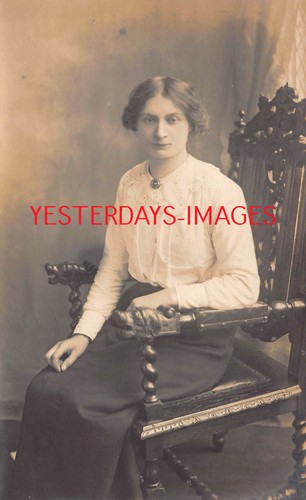 Woman sitting ornate chair - sitting,
