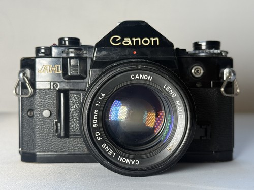 Canon 35mm camera with 50mm - 35mm,