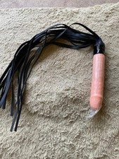 Novelty Faux Leather Whip with Flesh-Tone Handle – Fun Adult Costume or Party Ac