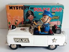 Nomura Mystery Police Car. Nomura Tinplate Mystery Police Car. Boxed. TN Toys. 