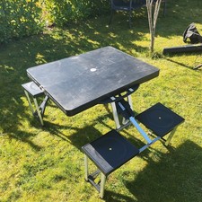 folding camping table and four