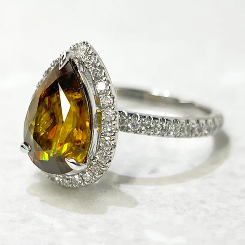 Sphene 24ct diamond halo - 3.24ct,