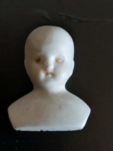 Antique shoulder plate doll