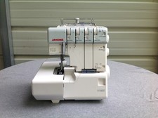 Janome 1110DX Serger Sewing Machine For Parts Or Repair