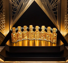Gold glass bottles corked - gold,