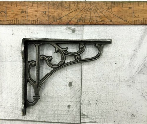 Pair cast iron ornate - pair, of