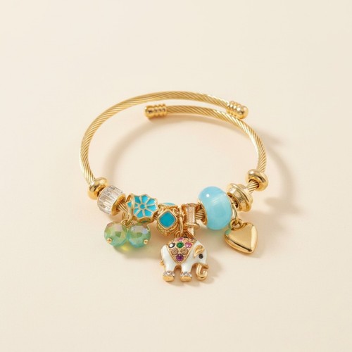 Gold tone charm bangle - gold,