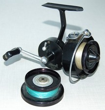 MITCHELL 305 FIXED SPOOL FISHING REEL & SPARE SPOOL VERY NICE.         (1338)