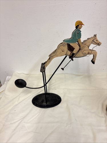 Antique polo player balancing - player,