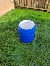 Plastic barrel with lid 60 litre capacity.