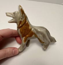 Carved Stone Wolf German
