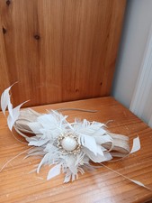 Cream/beige loop fascinator with feathers and beads on headband 