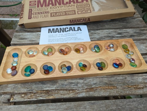 Mancala board and glass - board,