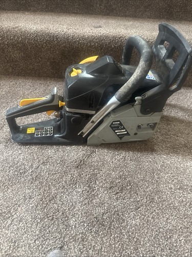 Titan chainsaw turns over - chainsaw,