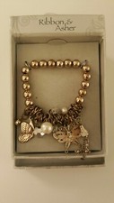 Ribbon and Asher Gold Mix Elastic Charm Bracelet- New with Box