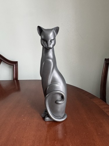 Sleek matte black ceramic cat