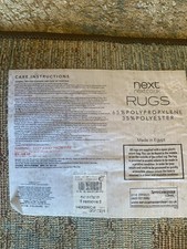 NEXT RUG 