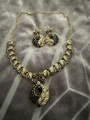 Necklace earrings and tika - and,