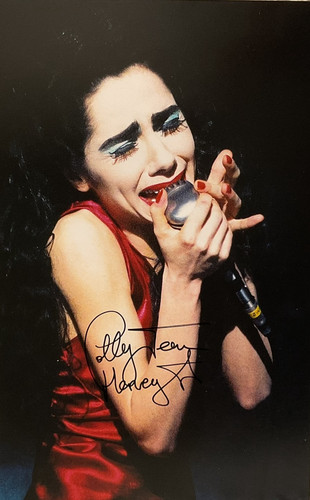 Harvey signed 8 photo - 8,
