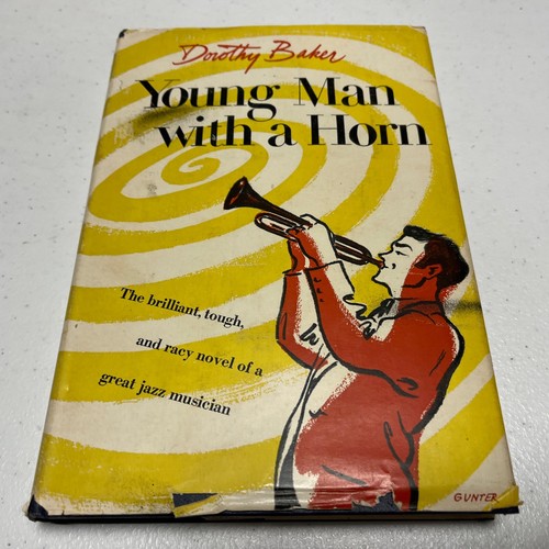 Young man with horn by - a,