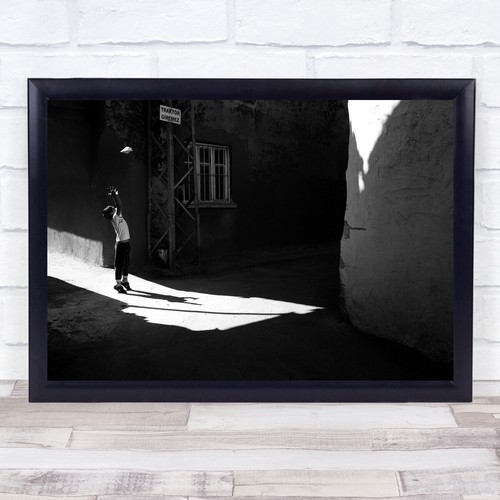 Child playing shadow - , buildings