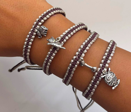 Adjustable braided cord charm