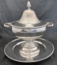 A silverplated large punch