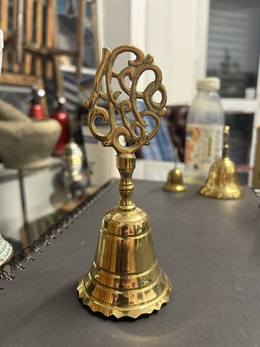 Vintage solid brass hand - hand, bell