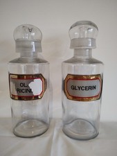 Pair  of unusual apothecary chemist bottles with pourers, domed lids and LUGs