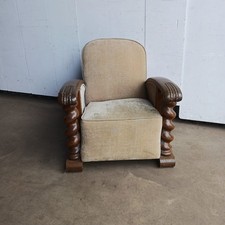 A large 1930’s carved club chair