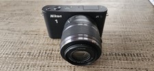 Nikon 1 J1  Compact Camera with a 30-110mm Lens 