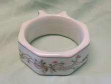 One 'Eternal Beau' napkin ring