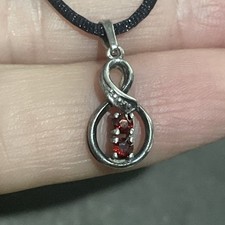 Vintage Silver 925 infinity design Red Garnet charm Pendant signed Teka maker