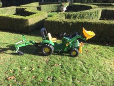 Large Rolly Toys John Deere pedal tractor with loader, back hoe & winch. 