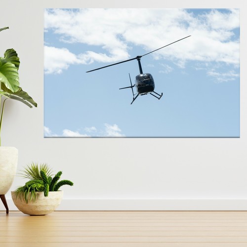 Black helicopter flying with - black,