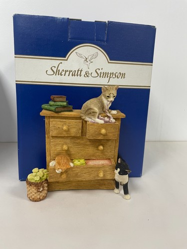 Sherratt simpson three - &,
