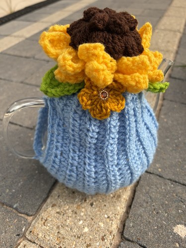 Crochet knitted tea cosy
